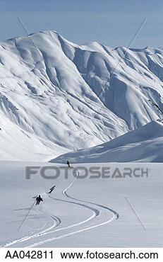 Stock Photography - skiers on powdery 
slope. fotosearch 
- search stock 
photos, pictures, 
images, and photo 
clipart