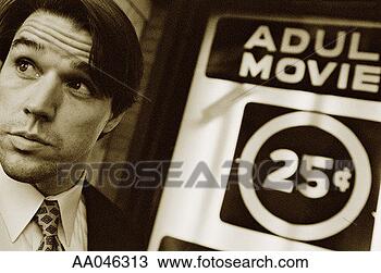 Stock Photo - businessman at 
peepshow. fotosearch 
- search stock 
photos, pictures, 
images, and photo 
clipart