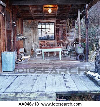 Stock Photo - deck of rustic 
cabin. fotosearch 
- search stock 
photos, pictures, 
images, and photo 
clipart