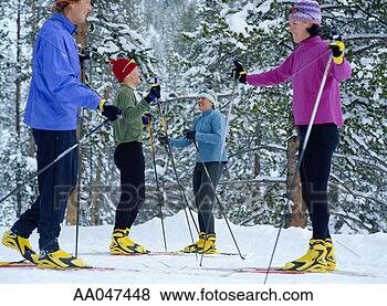 Stock Photo - friends on cross 
country skis, 
stopping to rest. 
fotosearch - search 
stock photos, 
pictures, images, 
and photo clipart