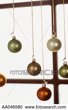 Stock Photography - hanging christmas 
ornaments. fotosearch 
- search stock 
photos, pictures, 
images, and photo 
clipart