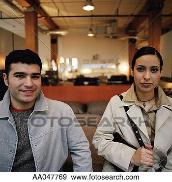 Stock Photograph - portrait of young 
couple shopping 
at modern furniture 
store. fotosearch 
- search stock 
photos, pictures, 
images, and photo 
clipart