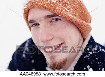 Stock Photo - portrait of young 
man in knit hat. 
fotosearch - search 
stock photos, 
pictures, images, 
and photo clipart