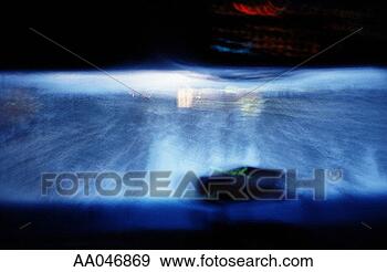 Stock Photograph - snowy highway 
through windshield 
at night. fotosearch 
- search stock 
photos, pictures, 
images, and photo 
clipart