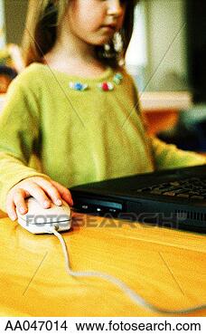 Stock Photo - young girl using 
laptop computer. 
fotosearch - search 
stock photos, 
pictures, images, 
and photo clipart