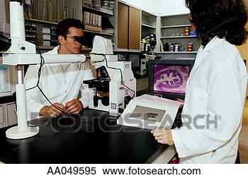 Stock Image - lab researchers 
examine tissue 
sample. fotosearch 
- search stock 
photos, pictures, 
images, and photo 
clipart