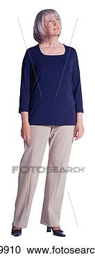 Stock Photography - mature woman standing, 
looking up. fotosearch 
- search stock 
photos, pictures, 
images, and photo 
clipart