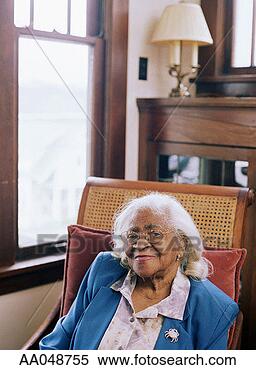 Stock Image - portrait of elderly 
woman in a chair. 
fotosearch - search 
stock photos, 
pictures, images, 
and photo clipart