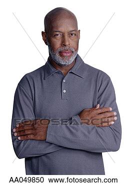 Stock Photography - portrait of mature 
man with arms 
crossed. fotosearch 
- search stock 
photos, pictures, 
images, and photo 
clipart