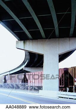 Stock Photograph - train underneath 
overpass. fotosearch 
- search stock 
photos, pictures, 
images, and photo 
clipart