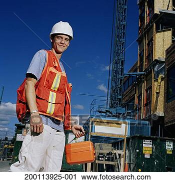 Stock Photography - male construction 
worker wearing 
hardhat and reflective 
vest, portrait. 
fotosearch - search 
stock photos, 
pictures, images, 
and photo clipart