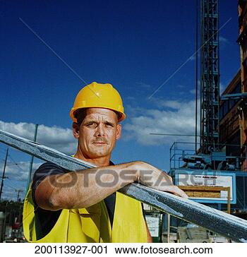 Stock Photography - male construction 
worker wearing 
hardhat, carrying 
beam, portrait. 
fotosearch - search 
stock photos, 
pictures, images, 
and photo clipart