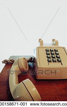 Stock Photography - telephone with 
receiver off hook 
(grainy). fotosearch 
- search stock 
photos, pictures, 
images, and photo 
clipart