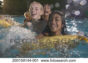 Stock Photography - three girls (10-12) 
having fun  in 
swimming pool. 
fotosearch - search 
stock photos, 
pictures, images, 
and photo clipart