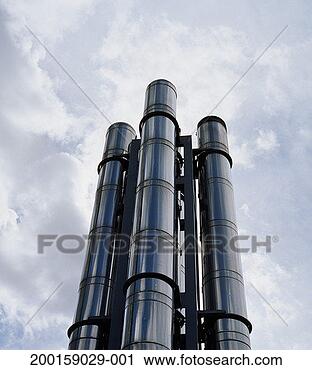 Stock Photography - exhaust stacks 
on side of office 
building, close-up, 
low angle view. 
fotosearch - search 
stock photos, 
pictures, images, 
and photo clipart