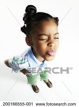 Stock Photography - girl (6-8) sticking 
out tongue, eyes 
closed, elevated 
view. fotosearch 
- search stock 
photos, pictures, 
images, and photo 
clipart