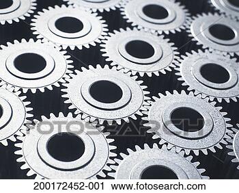 Stock Photography - interlocking cogs, 
full frame. fotosearch 
- search stock 
photos, pictures, 
images, and photo 
clipart