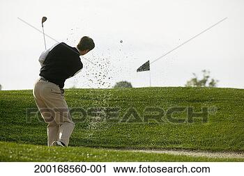 Stock Photography - man playing golf, 
rear view. fotosearch 
- search stock 
photos, pictures, 
images, and photo 
clipart