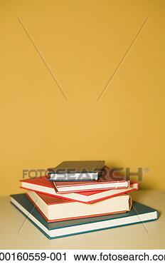 Stock Photography - stack of books 
on table. fotosearch 
- search stock 
photos, pictures, 
images, and photo 
clipart