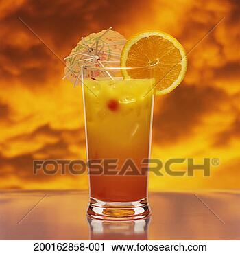Stock Photography - tequila sunrise 
with orange garnish. 
fotosearch - search 
stock photos, 
pictures, images, 
and photo clipart