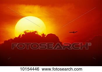 Stock Photo - aircraft md-80 
in sun and clouds. 
fotosearch - search 
stock photos, 
pictures, images, 
and photo clipart