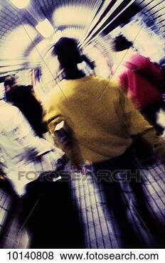 Stock Photo - commuters in subway 
station tunnel, 
london, england. 
fotosearch - search 
stock photos, 
pictures, images, 
and photo clipart