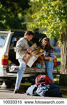 Stock Image - couple in their 
4 by 4 in santa 
fe, new mexico. 
fotosearch - search 
stock photos, 
pictures, images, 
and photo clipart