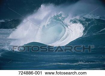 Stock Photography - crashing wave, 
rocky coastline 
in background. 
fotosearch - search 
stock photos, 
pictures, images, 
and photo clipart