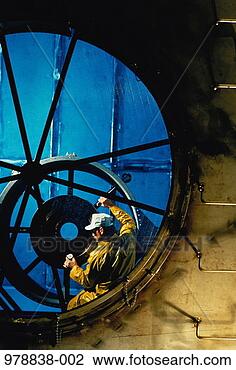Stock Photo - engineer testing 
turbine engine. 
fotosearch - search 
stock photos, 
pictures, images, 
and photo clipart