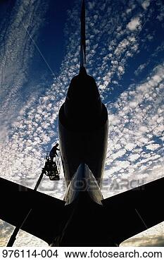 Stock Photo - engineer working 
on mcdonnell douglas 
dc-10 aircraft 
(wide angle). 
fotosearch - search 
stock photos, 
pictures, images, 
and photo clipart