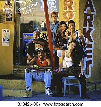 Picture - group of teenages 
(16-18) sitting 
outside off-licence. 
fotosearch - search 
stock photos, 
pictures, images, 
and photo clipart