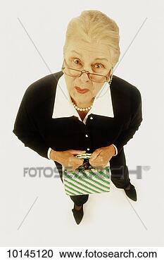 Stock Photography - humorous portrait 
of mature woman, 
wide angle. fotosearch 
- search stock 
photos, pictures, 
images, and photo 
clipart