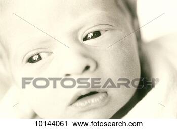 Stock Photography - infant face close 
up. fotosearch 
- search stock 
photos, pictures, 
images, and photo 
clipart