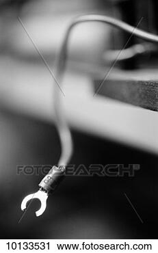 Stock Photography - loose electrical 
contact wire. 
fotosearch - search 
stock photos, 
pictures, images, 
and photo clipart