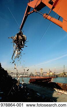 Stock Photography - mechanical grabber 
on harbour lifting 
pieces of scrap 
metal. fotosearch 
- search stock 
photos, pictures, 
images, and photo 
clipart