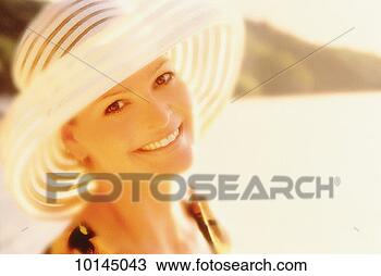 Stock Photo - middle-aged woman 
smiling, at beach, 
st john us virgin 
islands. fotosearch 
- search stock 
photos, pictures, 
images, and photo 
clipart