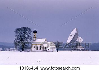 Stock Photo - satellite antenna 
and church in 
winter, germany. 
fotosearch - search 
stock photos, 
pictures, images, 
and photo clipart