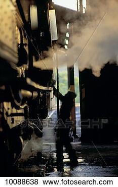 Stock Photo - steam locomotive 
in zimbabwe. fotosearch 
- search stock 
photos, pictures, 
images, and photo 
clipart