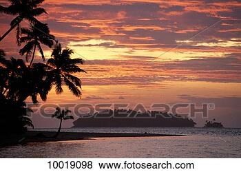 Stock Photo - sunset at aitutaki 
on the cook isles 
in polynesia. 
fotosearch - search 
stock photos, 
pictures, images, 
and photo clipart