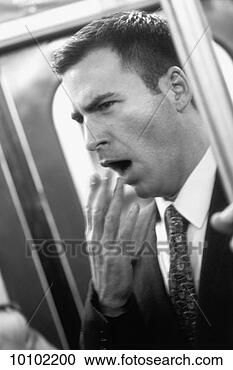 Stock Photography - tired man yawning 
in new york, usa. 
fotosearch - search 
stock photos, 
pictures, images, 
and photo clipart