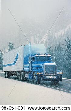 Stock Photography - truck and trailer 
on road during 
heavy snow. fotosearch 
- search stock 
photos, pictures, 
images, and photo 
clipart