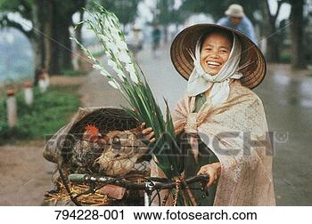 Stock Photography - vietnam, hanoi, 
woman on her way 
to market. fotosearch 
- search stock 
photos, pictures, 
images, and photo 
clipart