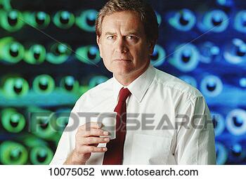 Stock Photo - warehouse manager 
with coffee cup. 
fotosearch - search 
stock photos, 
pictures, images, 
and photo clipart