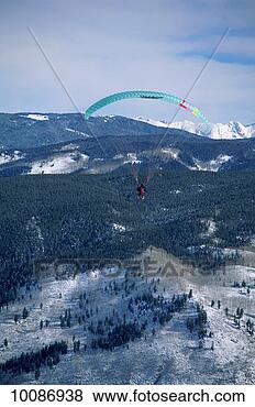 Stock Photo - winter paragliding 
in aspen, colorado. 
fotosearch - search 
stock photos, 
pictures, images, 
and photo clipart