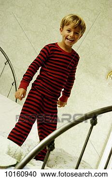 Stock Photography - young boy jumping 
on bed. fotosearch 
- search stock 
photos, pictures, 
images, and photo 
clipart