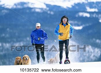 Stock Photo - young women with 
golden retrievers 
in colorado. fotosearch 
- search stock 
photos, pictures, 
images, and photo 
clipart