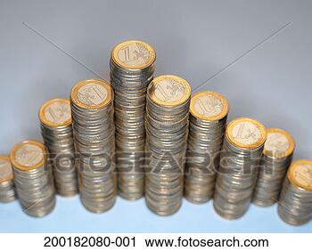 Stock Photography - euro currency: 
 stacked euro 
coins in triangular 
formation, close-up. 
fotosearch - search 
stock photos, 
pictures, images, 
and photo clipart