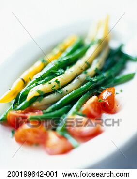Stock Photography - yellow and green 
string beans with 
cherry tomatoes. 
fotosearch - search 
stock photos, 
pictures, images, 
and photo clipart