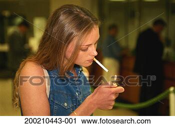 Stock Photography - young woman smoking. 
fotosearch - search 
stock photos, 
pictures, images, 
and photo clipart