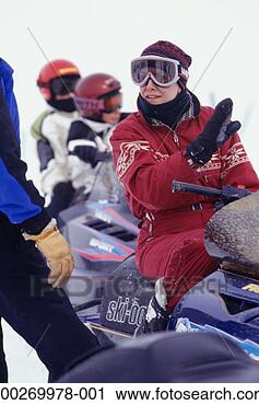 Stock Photography - people with snowmobiles 
talking on slope, 
two children in 
background. fotosearch 
- search stock 
photos, pictures, 
images, and photo 
clipart